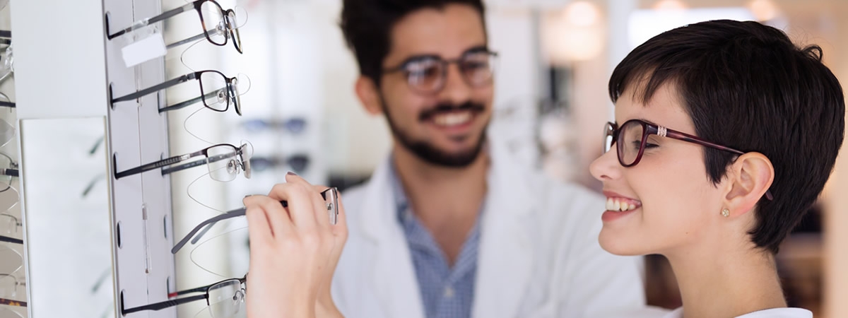 optician and customer in dispensary